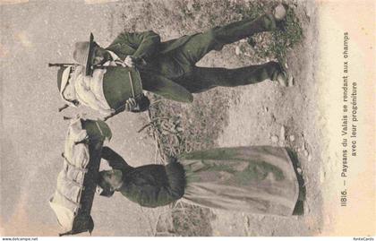 Valais Wallis Kanton VS Paysans du Valais se rendant aux champs avec leur progre