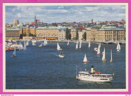 290311 / Sweden - Stockholm - Sailing Yacht racing in Downtown , Ship Building Cathedral PC Schweden Zweden