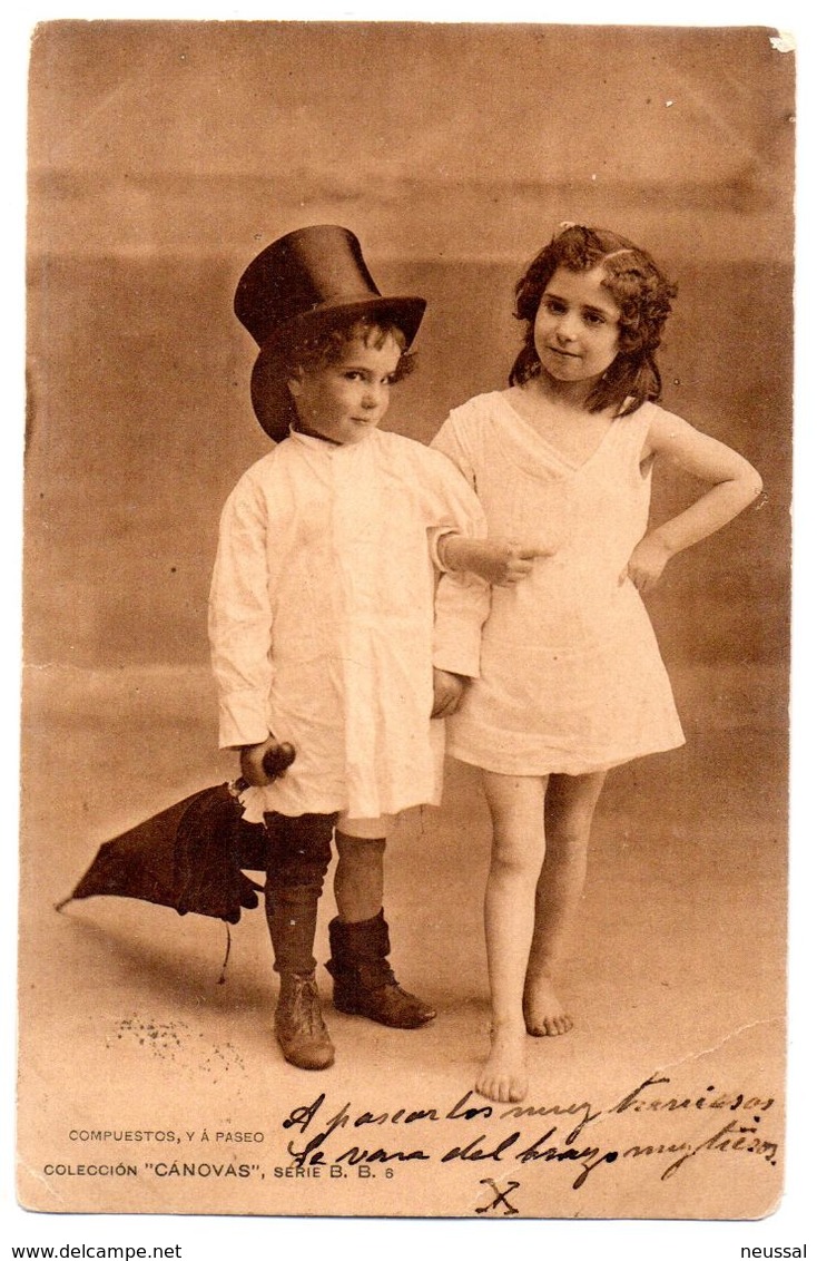 tarjeta postal de circulada con pareja de niños compuestos y a paseo.