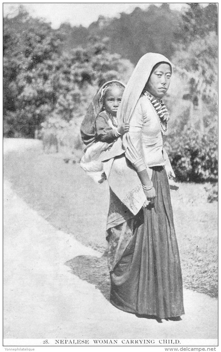 TIBET / Nepalese woman Carrying Child