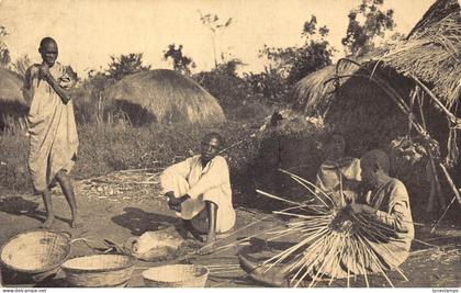 Uganda Natives at Basket Work Huts Ethnic vintage postcard