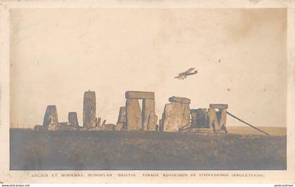 England - STONEHENGE - Ancient and Modern - Bristol Monoplane soars over megalithic structures