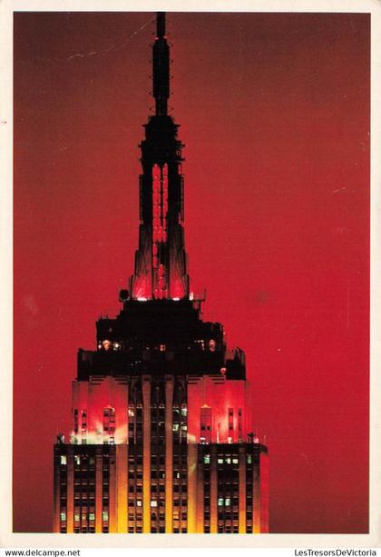 [-15%] ETATS UNIS - New York - The Empire States Building at night illuminated - Visible for 50 miles - Carte postale