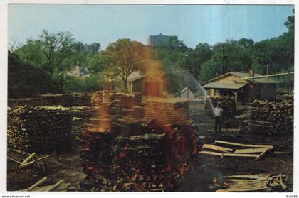 AK 234915 USA - Tennessee - Lynchburg - Jack Daniel Distillery - making characoal at Jack Daniel's