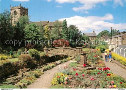 Waddington Lancashire Kinder am Bach Steinbruecke Kirche