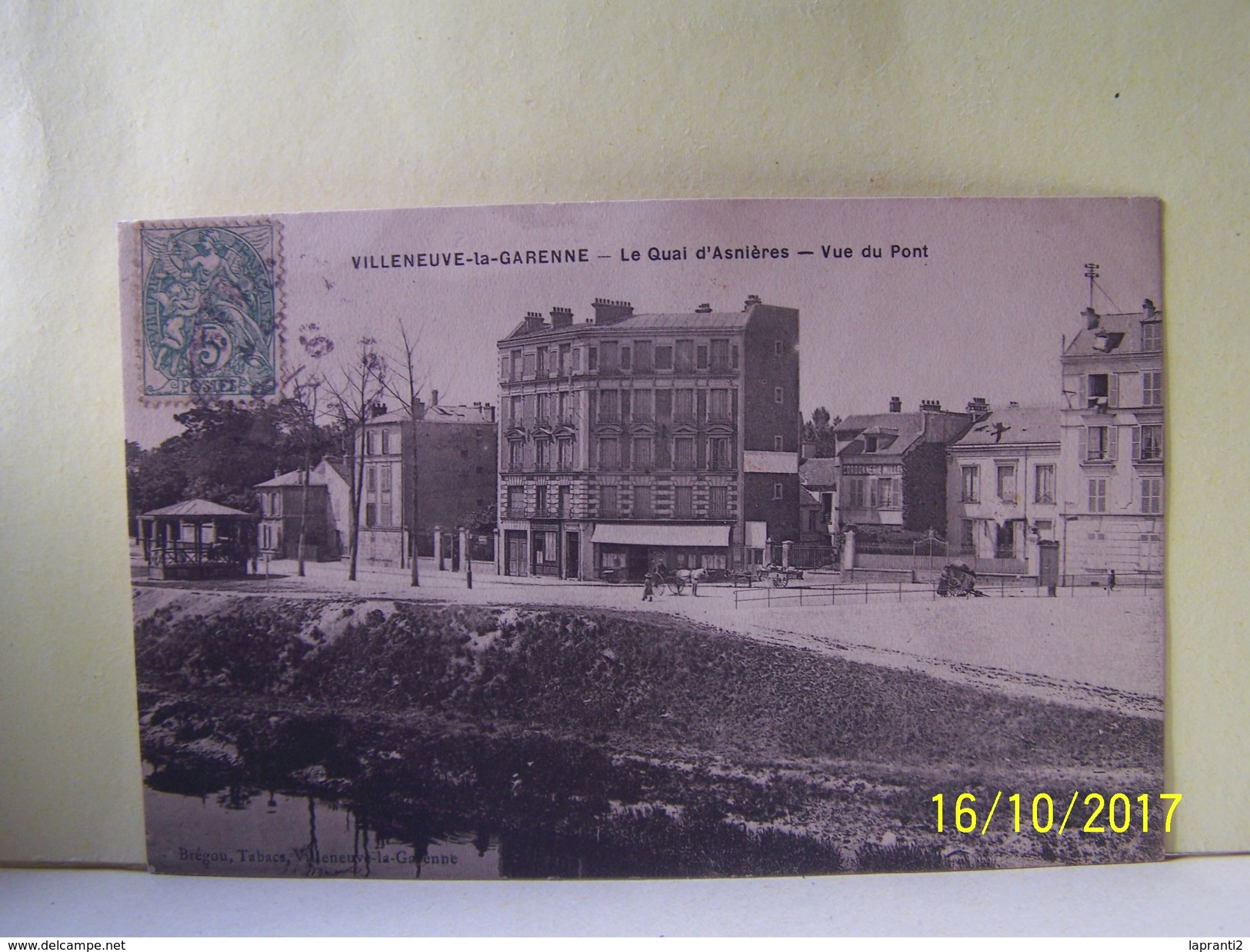 VILLENEUVE-LA-GARENNE ( HAUTS DE SEINE) LES KIOSQUES A MUSIQUE. LES COMMERCES. LE QUAI D'ASNIERES. VUE DU PONT.