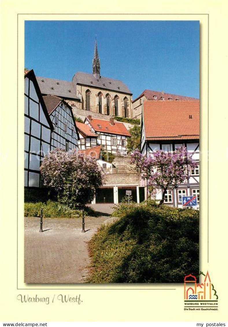 Warburg Westfalen Altstadt Fachwerkhaeuser Baumbluete Kirche