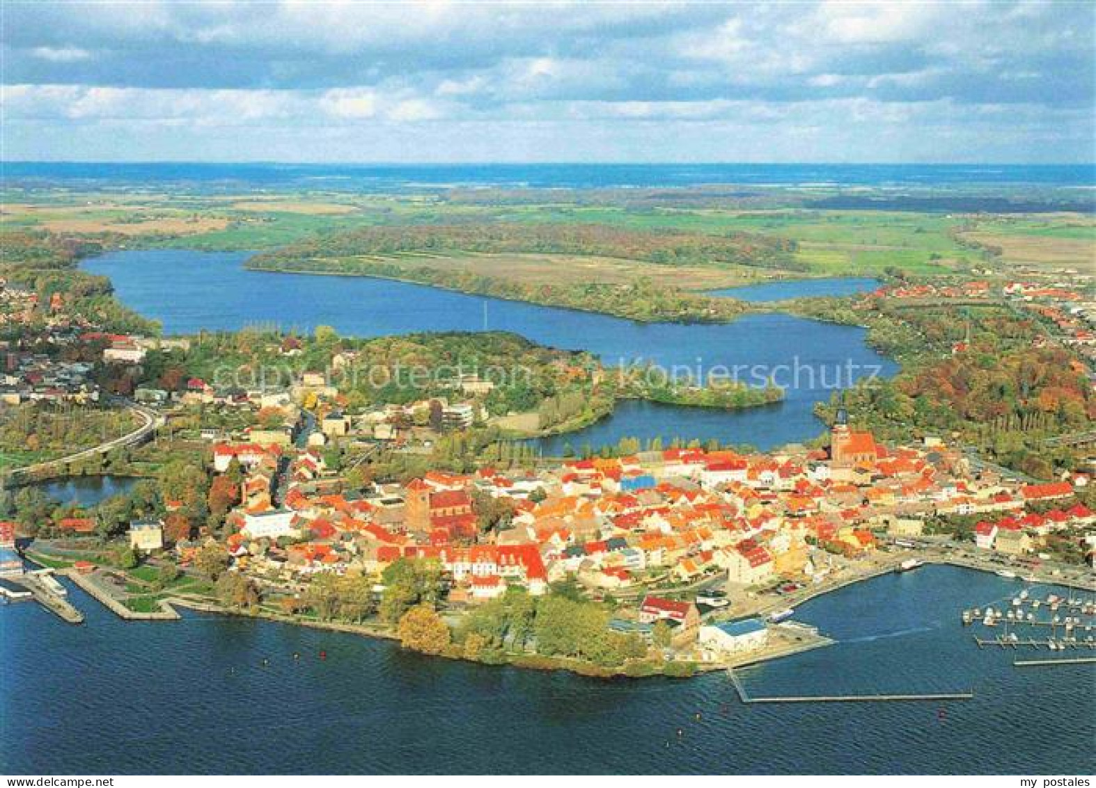Waren Mueritz Waren Mueritz Altstadt Hafen Tiefwaren-See Luftbild Kirchturm Flie