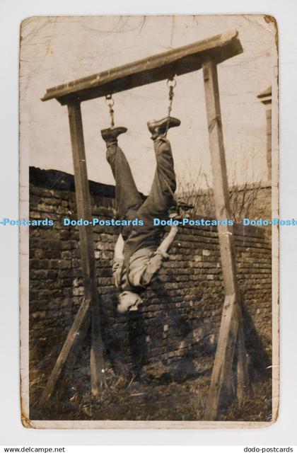 C029870 Man Hanging Upside Down Postcard