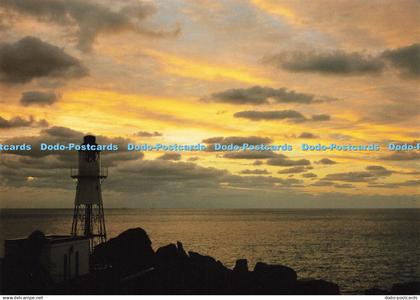 D184222 Isles of Scilly. St. Mary. Sunrise over Peninnis Lighthouse. Beric Tempe