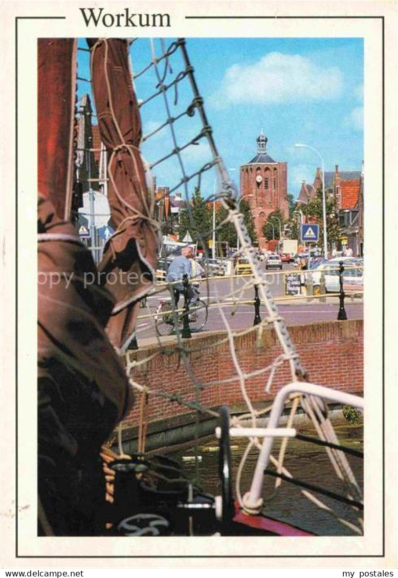 Workum Friesland NL Kirchturm Kanal Segelboot Fahrrad Strassenszene Hafenbereich