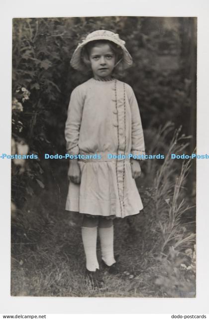 C030044 Stoke on Trent Girl Standing in the Garden 1912 Postcard
