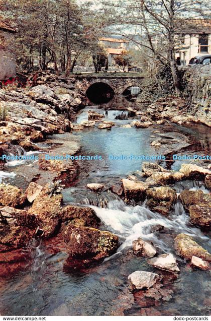 D111733 Cheddar. The River Yeo Which Through Cheddar Village. J. Arthur Dixon