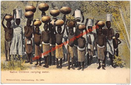 Native Children carrying water