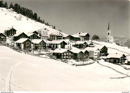 Ladir GR Winterpanorama mit Kirche